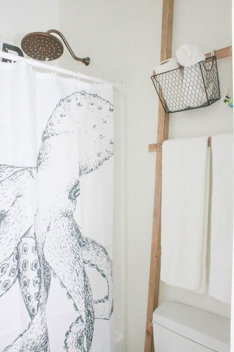 small bathroom storage ideas - ladder over toilet storage